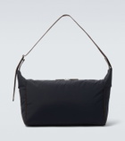 The Row Logan E/W leather-trimmed crossbody bag