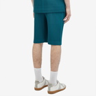 Homme Plissé Issey Miyake Men's Pleated Shorts in Teal Green