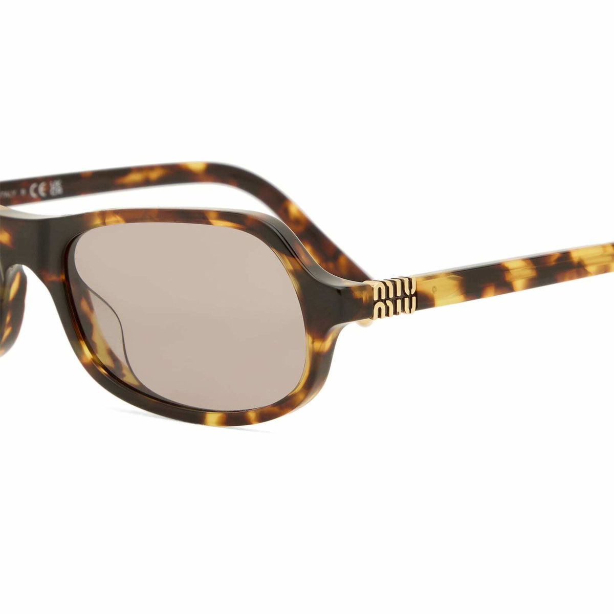 Miu Miu Eyewear B10SU Sunglasses in Honey Havana/Light Purple Brown 