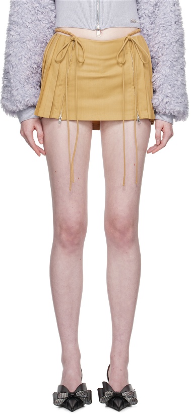 Photo: Nodress Tan Low-Waist Miniskirt