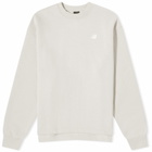 New Balance Women's Linear Heritage Brushed Back Fleece Crewneck in Moonrock