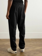 Fear of God - Tapered Logo-Appliquéd Shell Sweatpants - Black