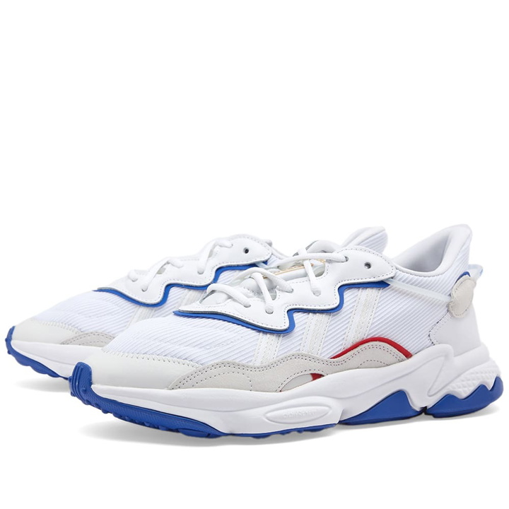 Photo: Adidas Men's Ozweego Sneakers in White/Team Royal Blue