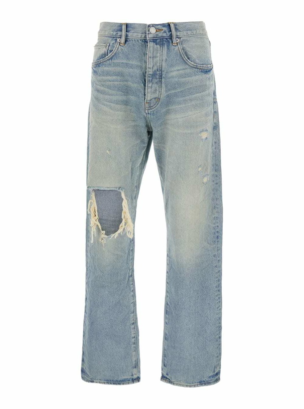 Photo: Purple Brand Light Blue Jeans With Logo Patch On The Rear And Maxi Ripping On The Front In Denim Man