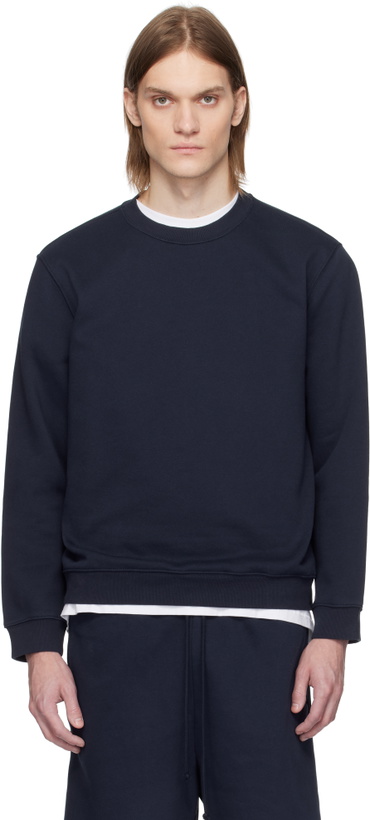 Photo: SKIMS Navy Fleece Lounge Classic Sweatshirt