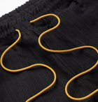 Rhude - Cropped Appliquéd Pinstriped Cotton Drawstring Trousers - Black