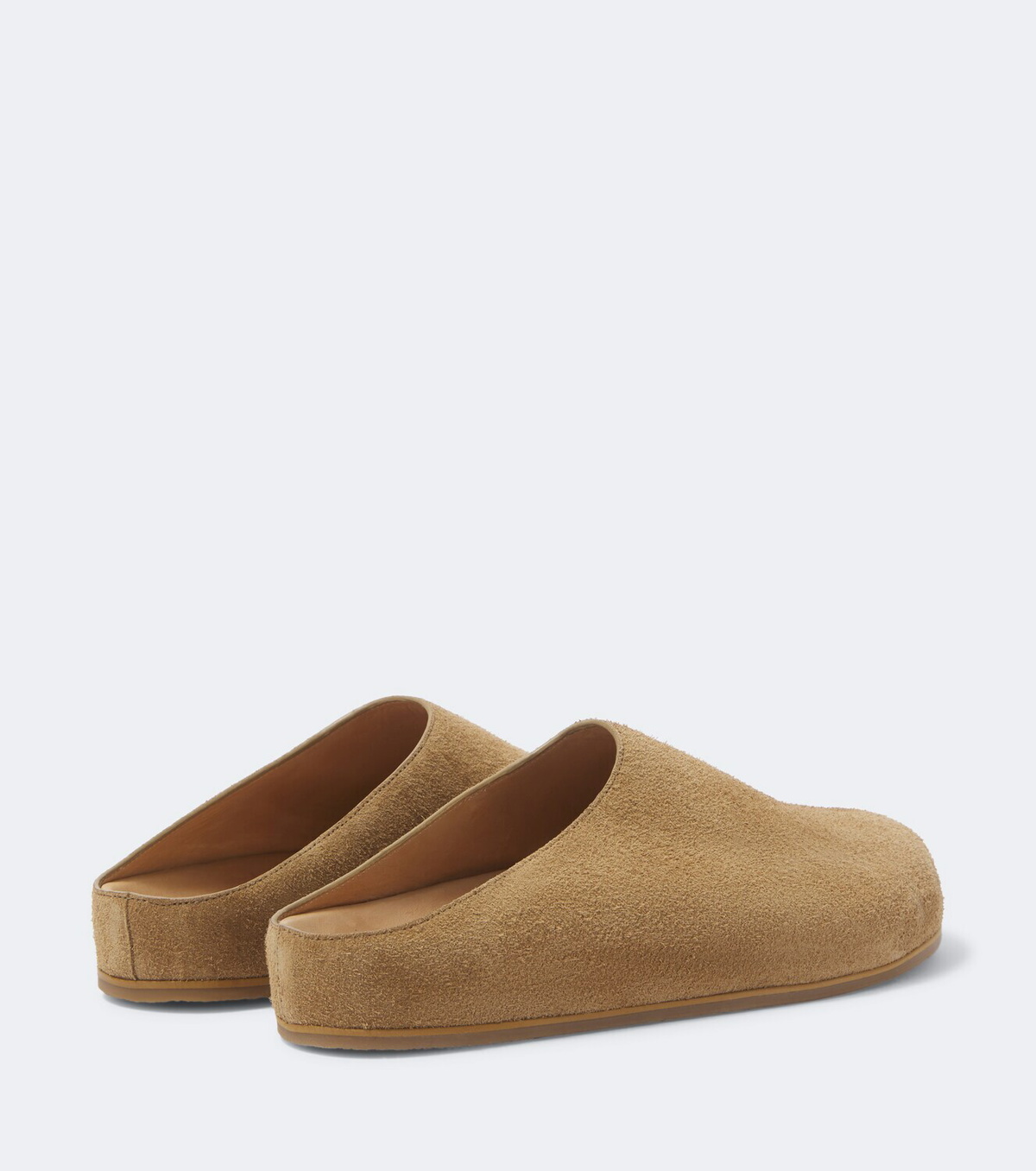 Studio Nicholson Wearing suede mules