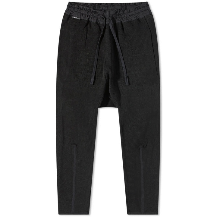 Photo: BYBORRE Men's Tapered Cropped Pants in Forest Dusk