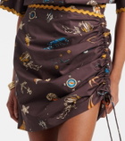 Alémais Printed ruched cotton miniskirt