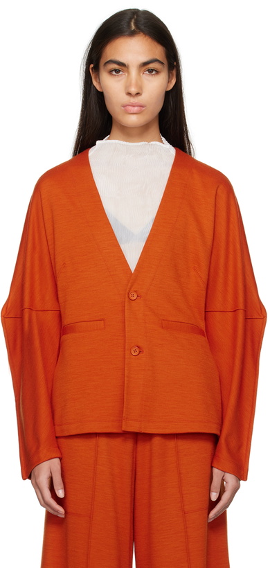 Photo: ISSEY MIYAKE Orange Tucked Cardigan