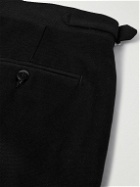 Stòffa - Tapered Pleated Cotton-Canvas Trousers - Black