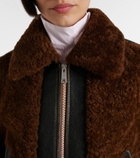 Prada Belted shearling-trimmed leather jacket