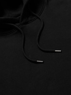 C.P. Company - Logo-Appliquéd Garment-Dyed Cotton-Jersey Hoodie - Black