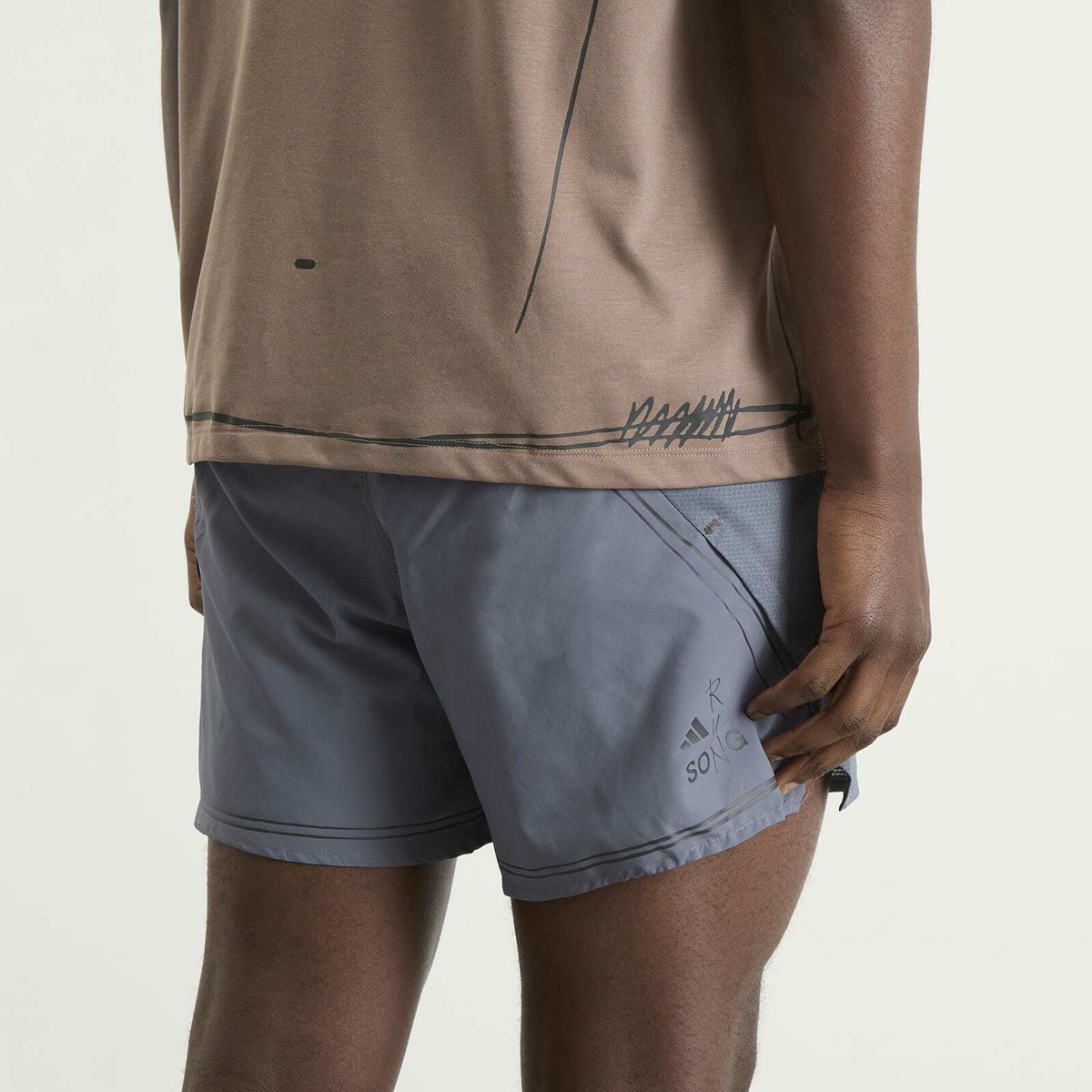 Adidas Men's x Song for the Mute Running Shorts in Onix
