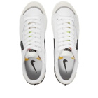 Nike Men's Blazer Low '77 Jumbo Sneakers in White/Black/Volt/Orange