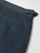 Stòffa - Tapered Pleated Cotton-Canvas Trousers - Blue