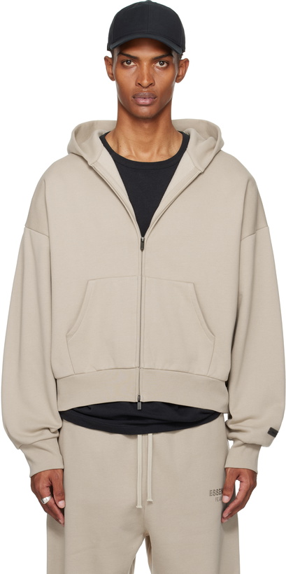 Photo: Fear of God ESSENTIALS Taupe Classic Fit Fleece Zip-Up Hoodie