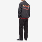 The Trilogy Tapes Men's Three People Coach Jacket in Black