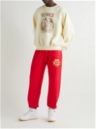 Y,IWO - Tapered Logo-Print Cotton-Jersey Sweatpants - Red