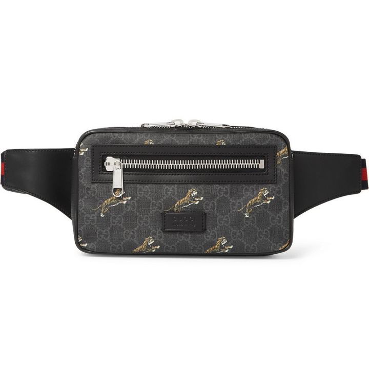 Photo: Gucci - Leather-Trimmed Monogrammed Coated-Canvas Belt Bag - Black