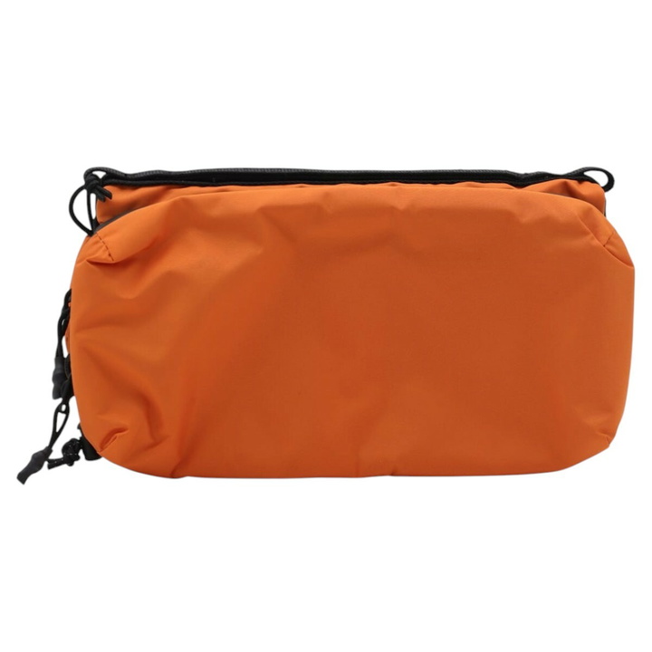 Photo: Maison Kitsuné Orange Briefcase
