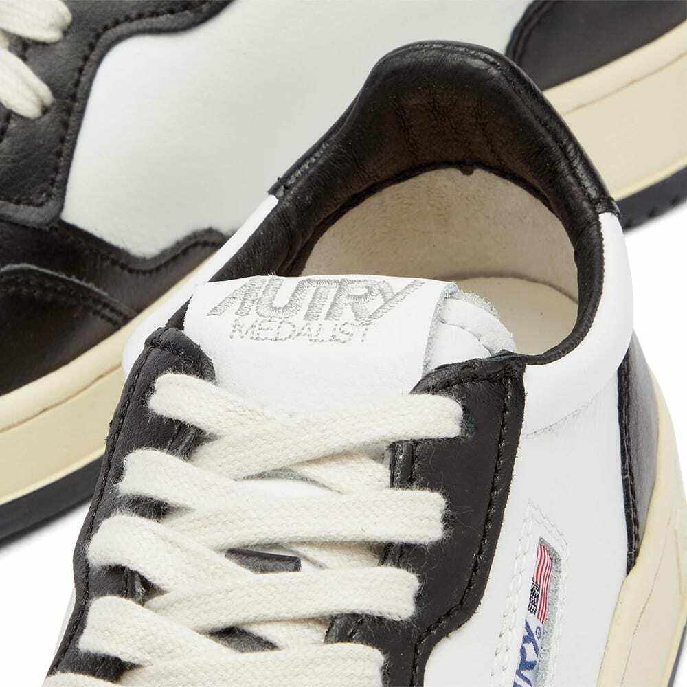 Autry Women's Medalist Low Sneakers in Black/White