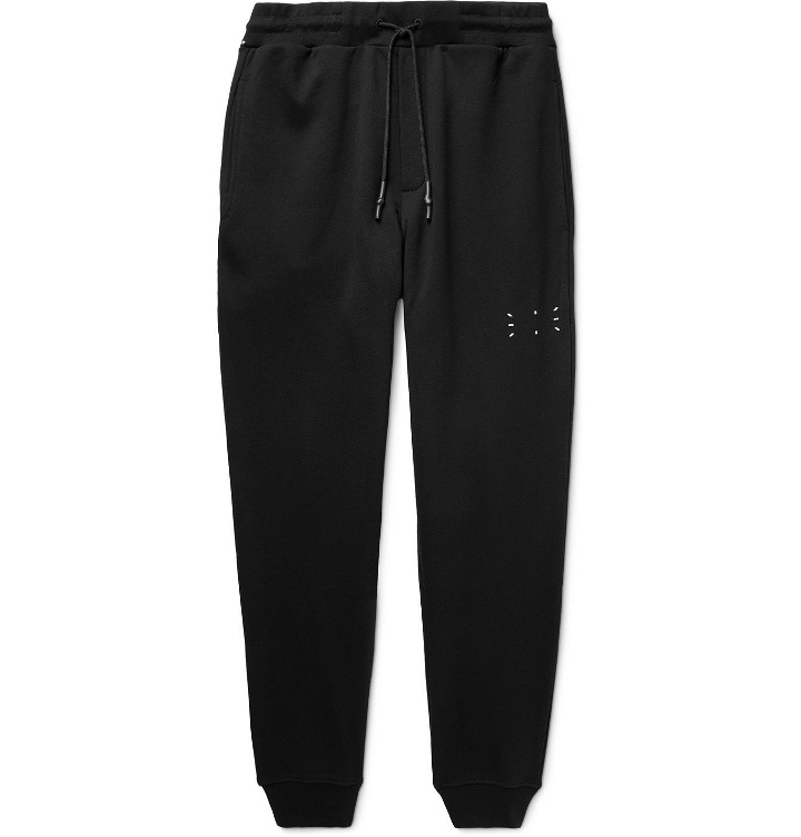 Photo: MCQ - Tapered Appliquéd Loopback Cotton-Jersey Sweatpants - Black