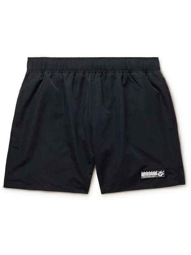 Photo: Vetements - Short-Length Logo-Appliquéd Swim Shorts - Black
