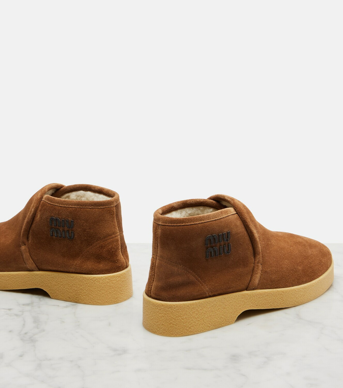 Miu Miu Shearling-lined suede boots