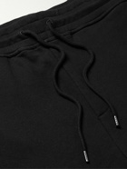 C.P. Company - Tapered Panelled Logo-Appliquéd Cotton-Jersey Sweatpants - Black