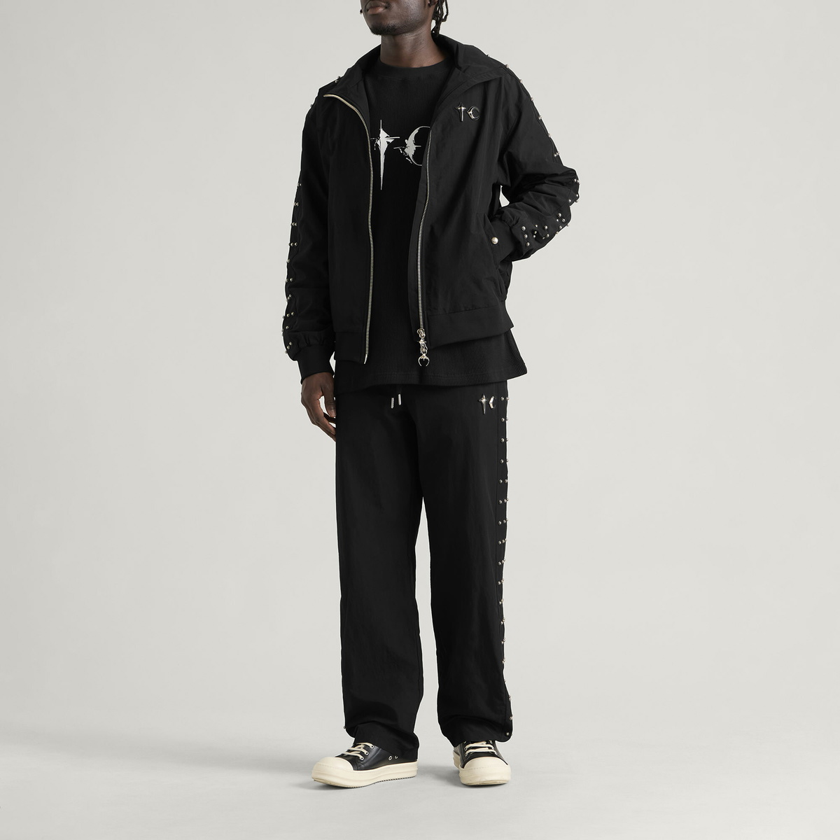 Thug Club Men's Triple Line Stud Track Pants in Black