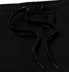 BURBERRY - Tapered Printed Loopback Cotton-Jersey Sweatpants - Black