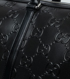 Gucci - GG embossed leather duffel bag