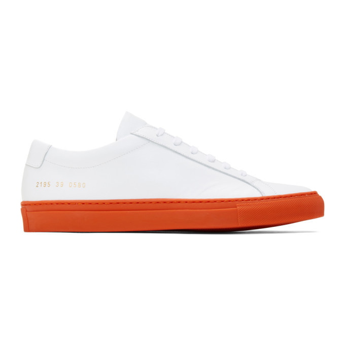 Photo: Common Projects White and Orange Achilles Low Sneakers