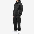 Nike Men's x NOCTA Tech Fleece Pant in Black/University Gold