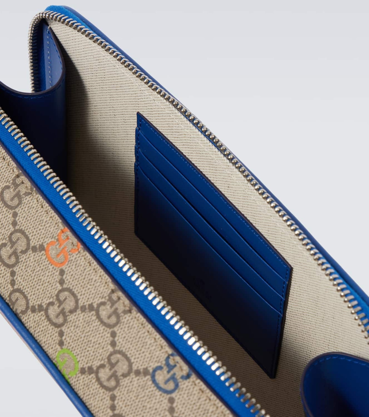 Gucci GG Canvas leather-trimmed shoulder bag