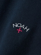 Noah - Core Tapered Logo-Embroidered Cotton-Jersey Sweatpants - Blue