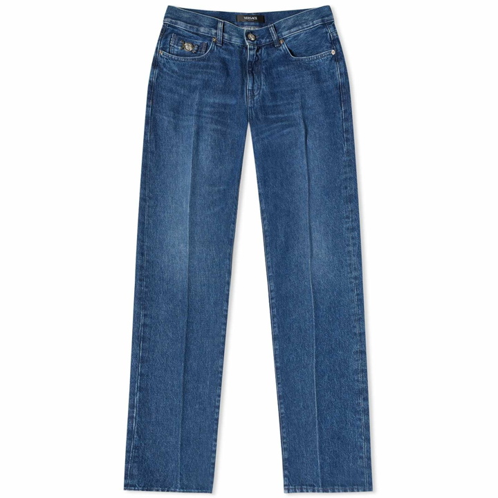 Photo: Versace Men's Tapered Jeans in Washed Medium Blue