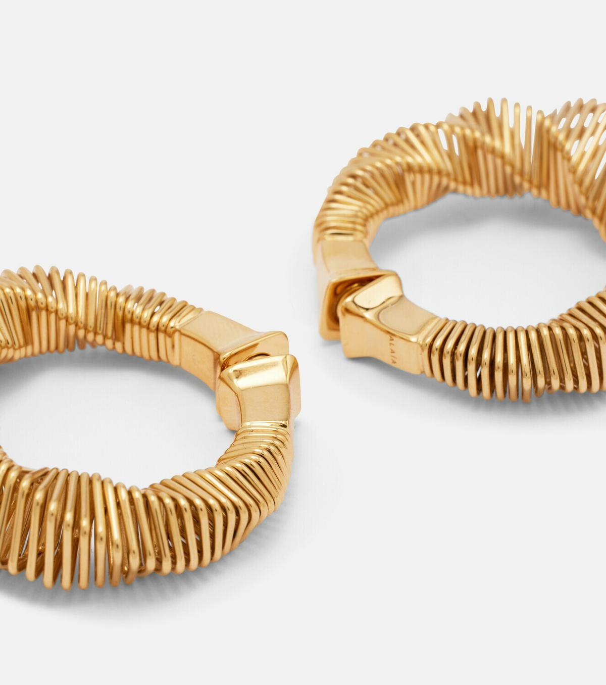 Alaïa Square Spiral hoop earrings