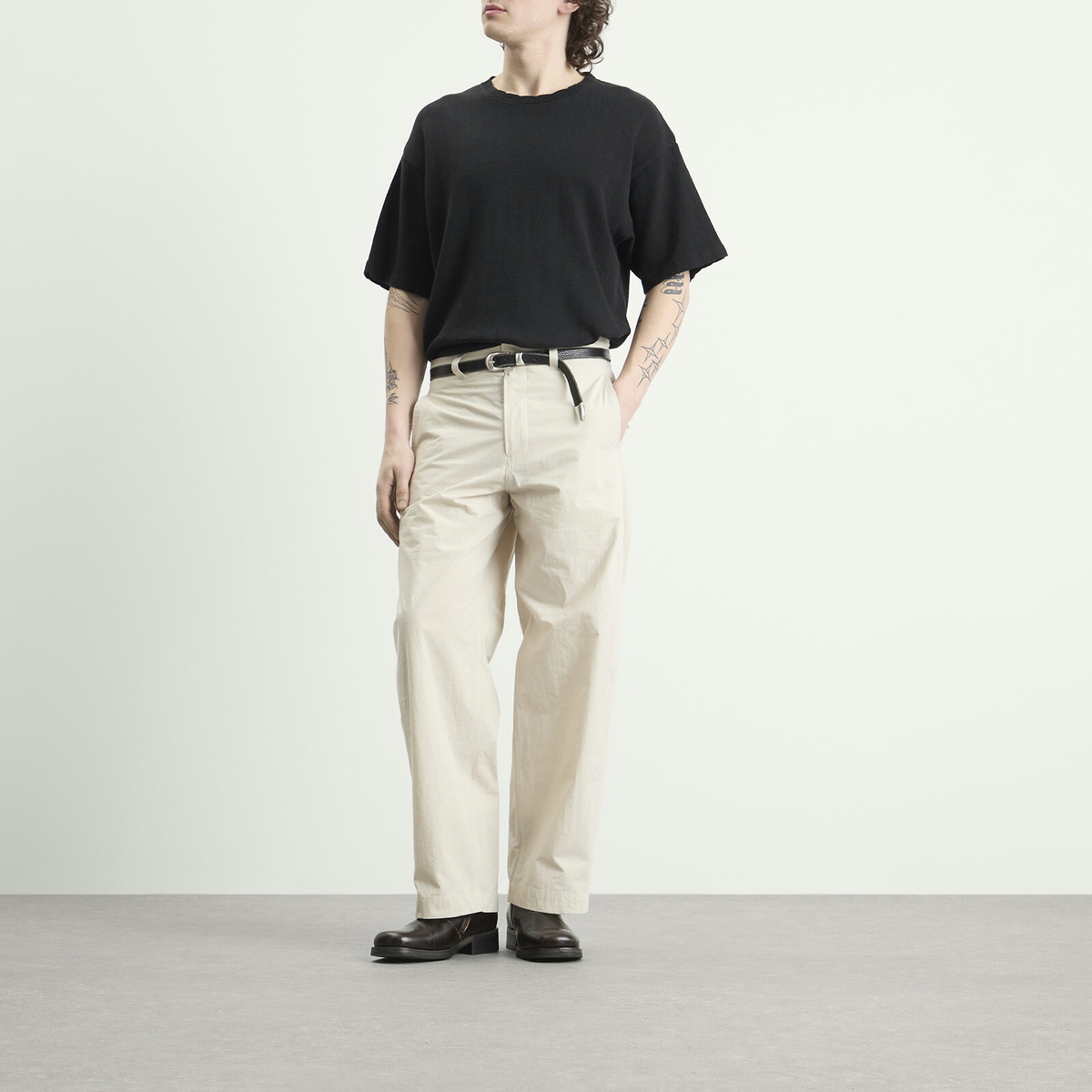 A Kind of Guise Men's Thuy Open Knit T-Shirt in Aran Black