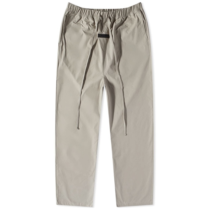 Photo: Fear of God ESSENTIALS Men's Woven Relaxed Trouser in Seal