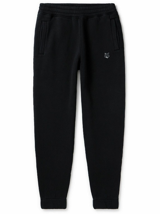 Photo: Maison Kitsuné - Tapered Logo-Appliquéd Cotton-Jersey Sweatpants - Black