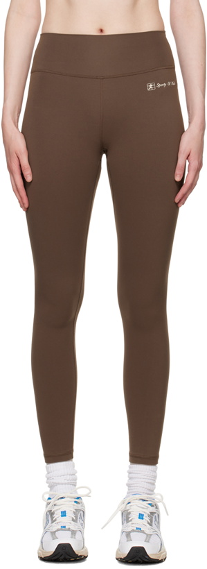 Photo: Sporty & Rich Brown Runner Script Leggings