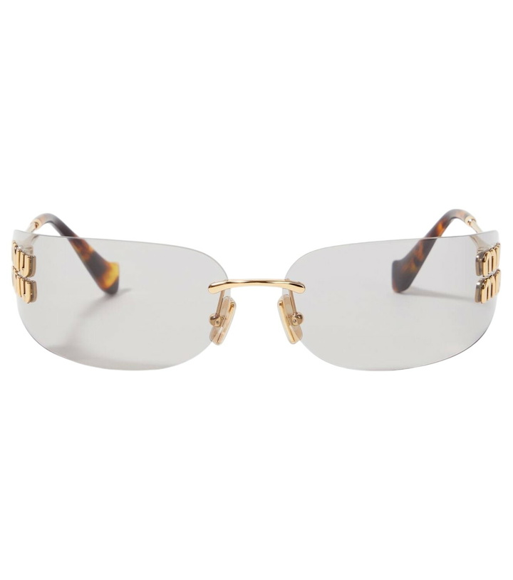 Photo: Miu Miu Logo oval sunglasses