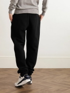 SAINT LAURENT - Tapered Logo-Embroidered Cotton-Jersey Sweatpants - Black