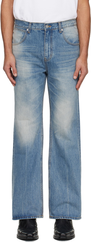 Photo: TONYWACK Blue Flared-Leg Jeans