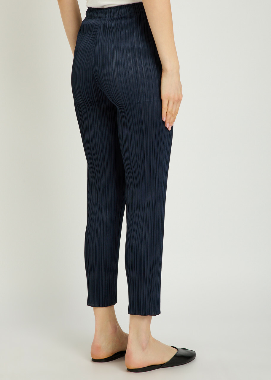 Pleats Please Issey Miyake Pleated Tapered-leg Woven Trousers Navy