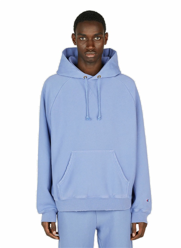 Photo: Champion - Logo Embroidered Hooded Sweatshirt in Blue