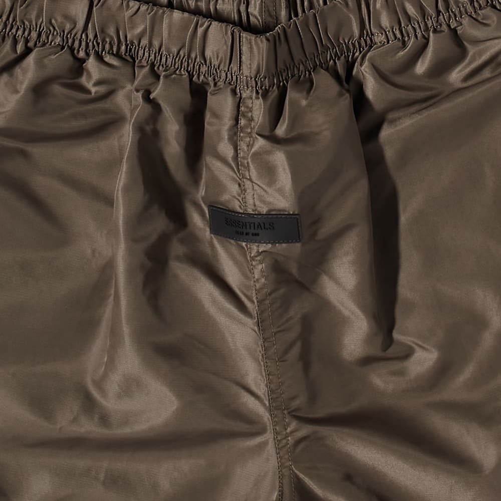 Fear of God ESSENTIALS Logo Running Shorts in Wood
