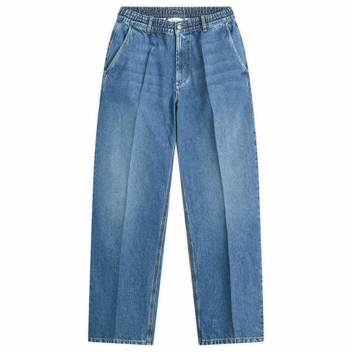 Photo: Foret Men's Clay Creased Denim Trousers in Vintage Blue